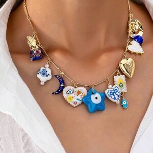 Anthropologie Gold and Blue Charm Necklace Glass Beads
